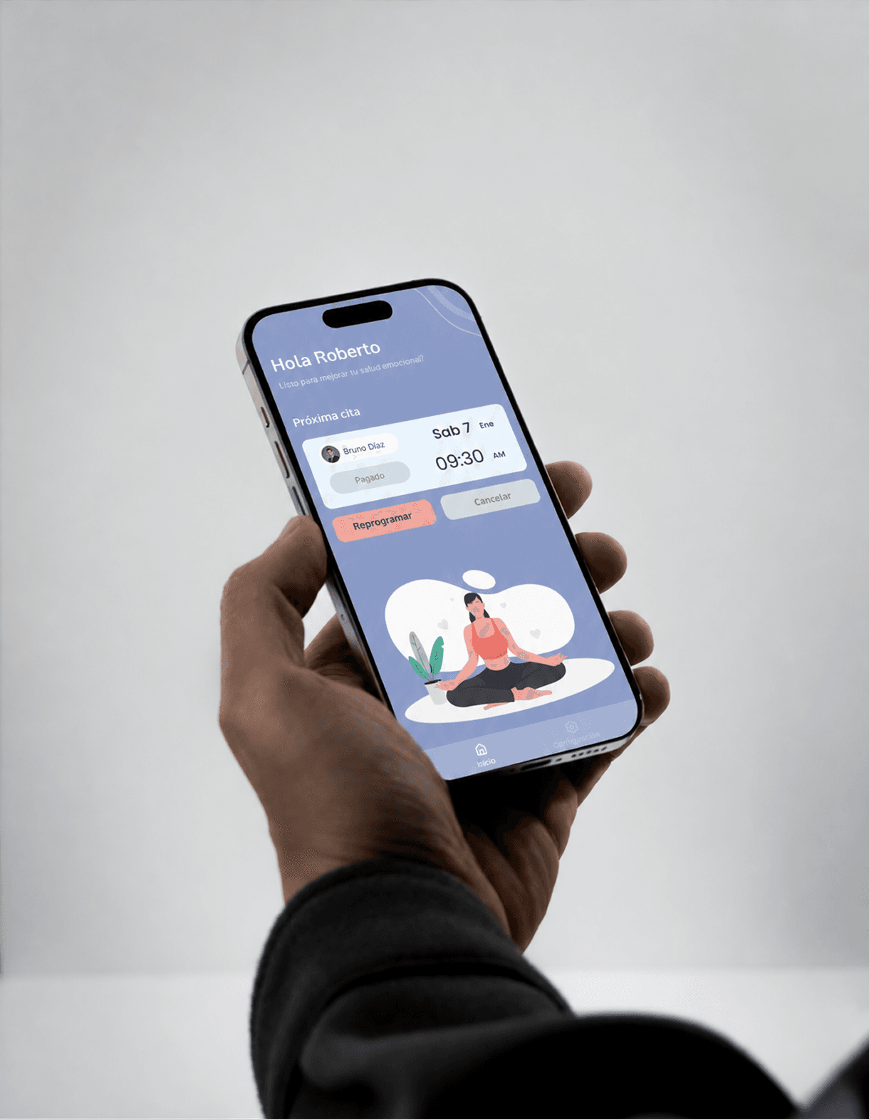 Patient holding a phone showing the continualatam upcoming therapy appointment experience